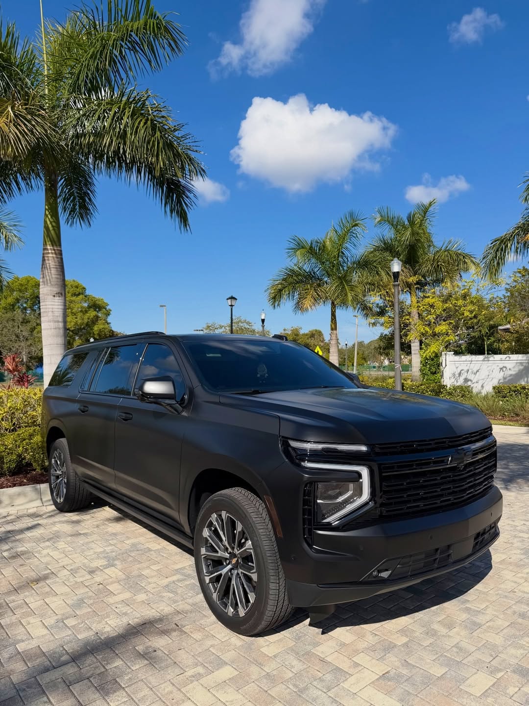 SUV with custom wrap and window tint by Moe Wraps in Deerfield Beach FL